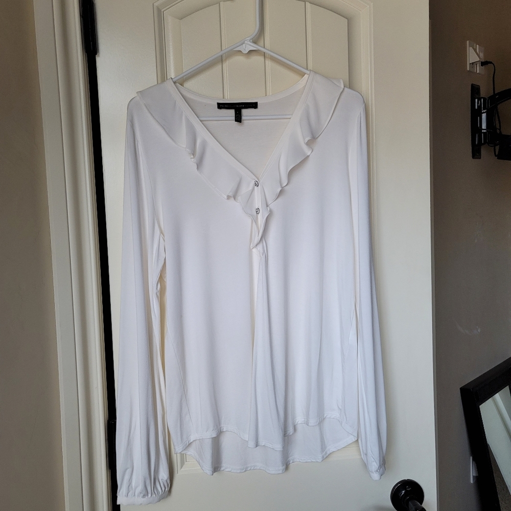 Ivory ,long sleeved blouse with rinestone buttons